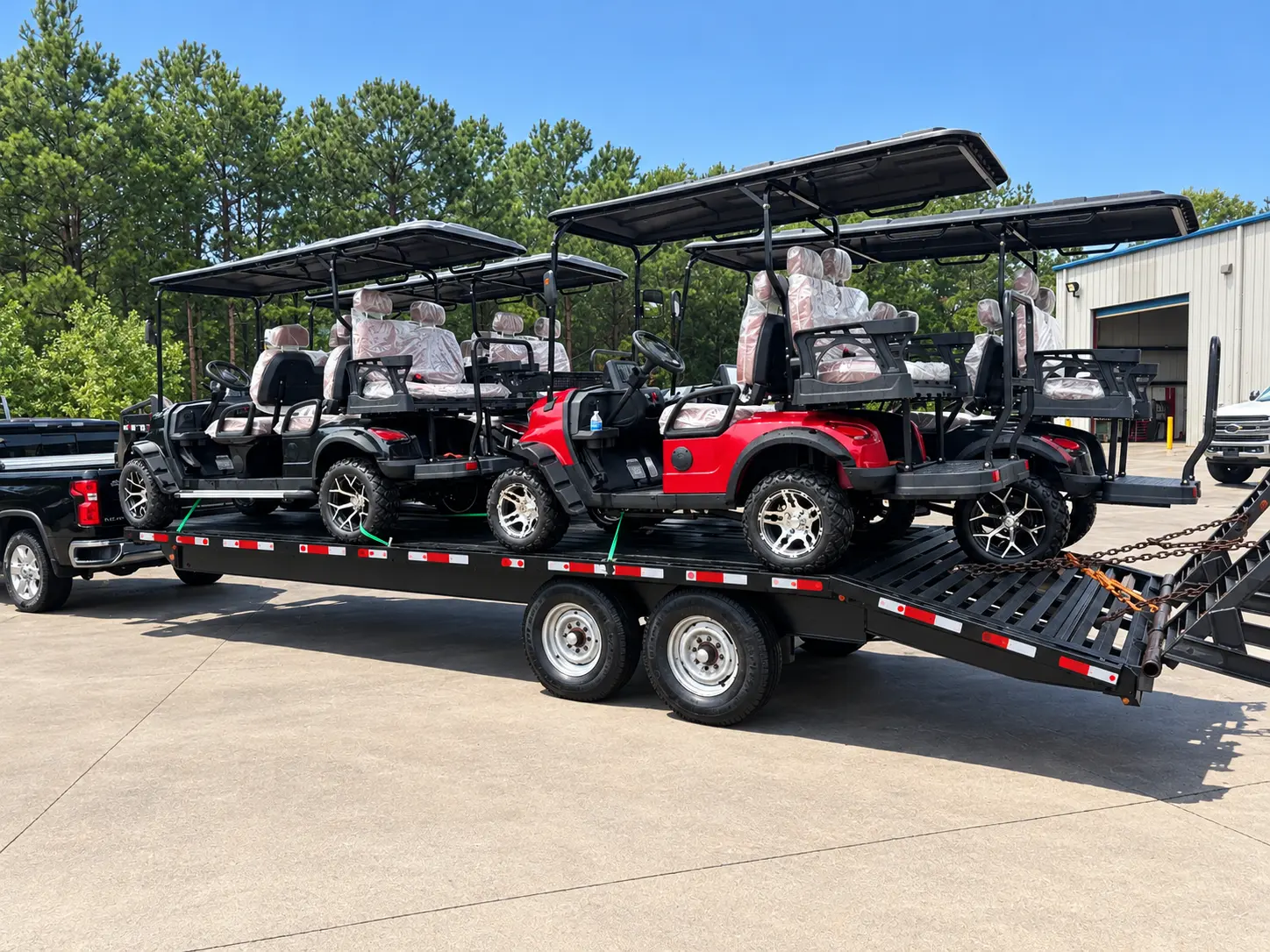 MTW trailer delivering electric golf cart rentals to an event site in Ottawa